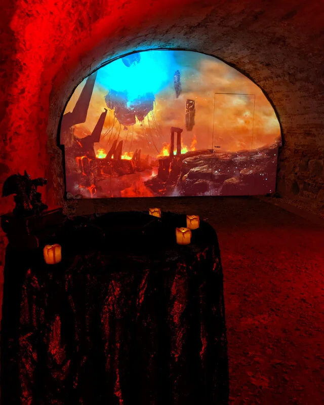 Cosplayer in the 16th century dungeon with DMX lighting